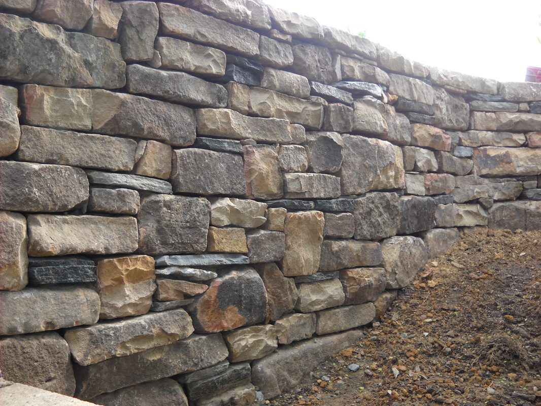 Stone retaining wall natural landscape walls cording cordinglandscape built